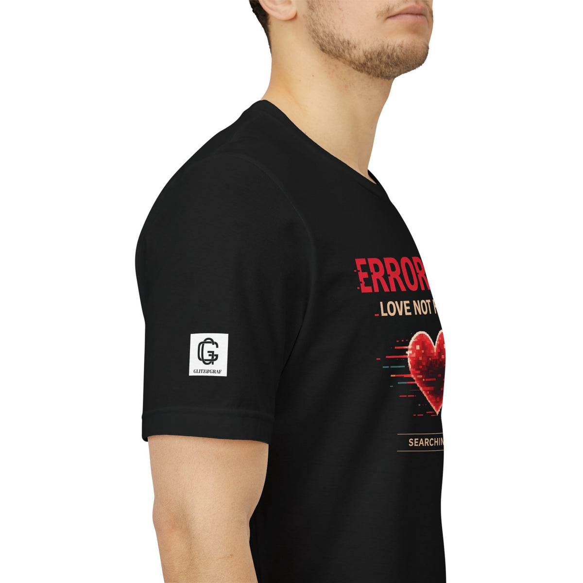 Man wearing a black t-shirt with glitch heart design and text “Error 404 Love Not Found”, on a white background