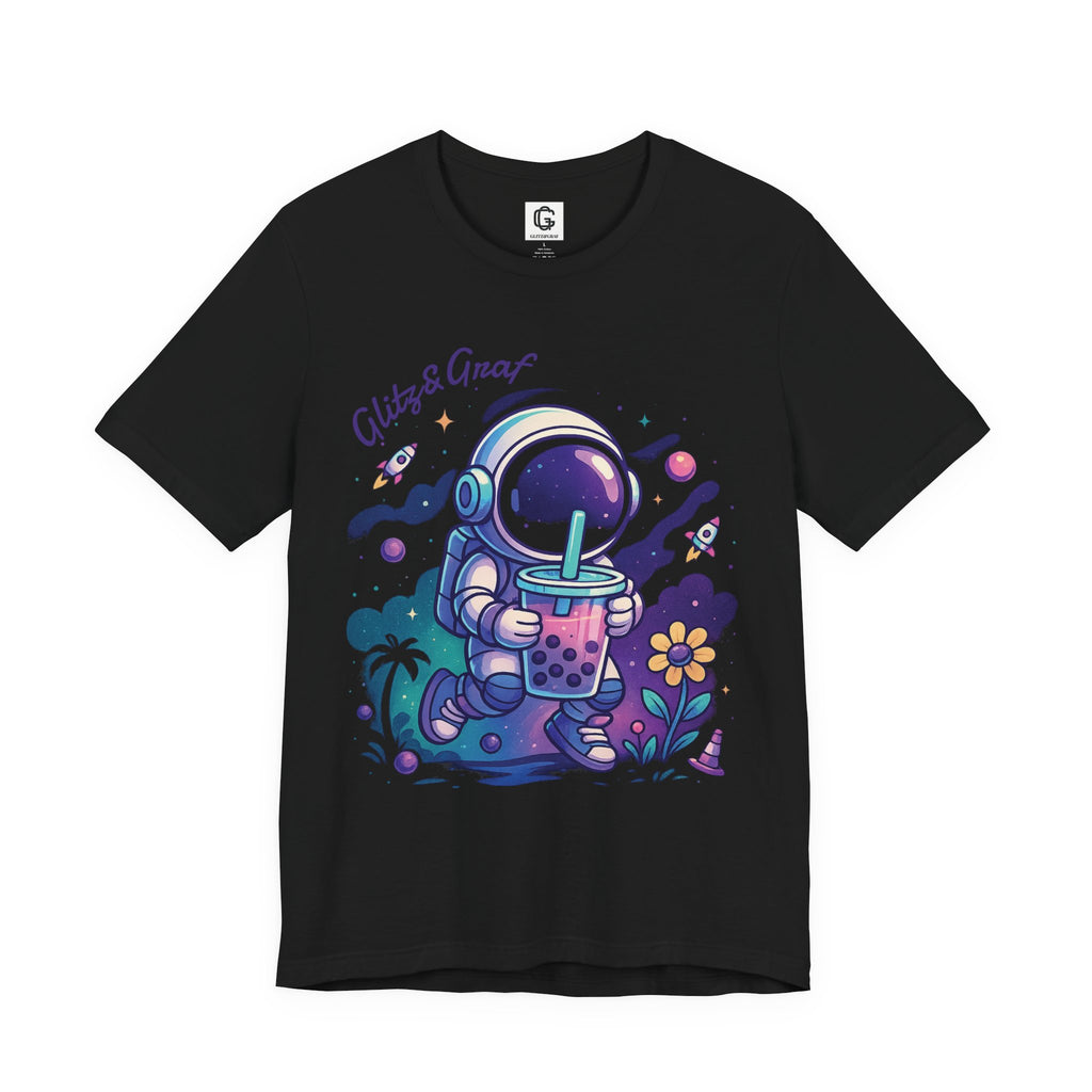 Black t-shirt with a colorful astronaut design holding a bubble tea, on a white background.